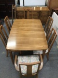 Vintage wood dining room table w/ 3 leaf, 6 chairs / matching buffet.