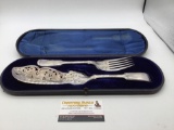 Ornate mid 1800?s Ellington and co silver plate larger cake and fork set in original case