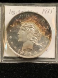 1985 Peace Dollar style .999 Silver 1 oz round coin. Nicely toned coin