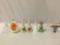 7 pc. lot of glass / ceramic collectible bells; Enesco 1979 female figure and more.