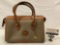 Dooney and Bourke all weather leather ladies handbag purse, approx 12 x 6 x 8 in.