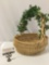 Large woven wicker basket w/ handle and faux foliage, approx 14 x 16 x 15 in.