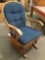 Vintage wood glide rocking chair w/ blue cushion, approx 26 x 24 x 37 in.