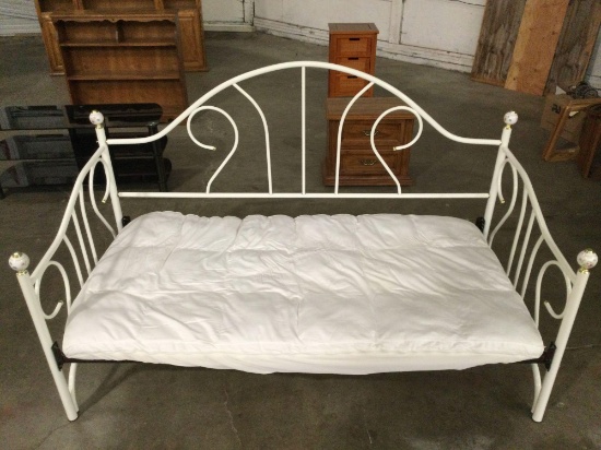 White metal day bed w/ mattress topper, good condition, approx 80 x 40 x 50 in.