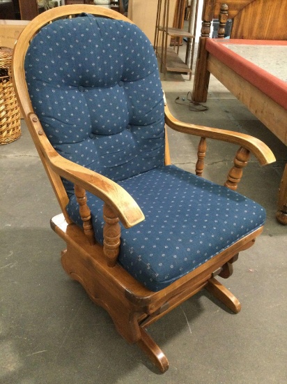 Vintage wood glide rocking chair w/ blue cushion, approx 26 x 24 x 37 in.