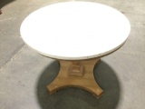Vintage wood round side table with slate top, approximately 26 x 21 in.