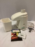 The Juiceman electric juicer w/ booklet/cassette, tested/working, approx 10 x 13 x 7 in.