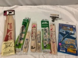 Lot of balsa wood / Blue Angels flying paper airplane models in sealed packages. See pics.