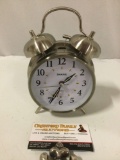 Sharp vintage style chrome battery operated alarm clock, approx 5 x 7 x 2 in.