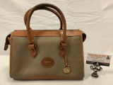 Dooney and Bourke all weather leather ladies handbag purse, approx 12 x 6 x 8 in.