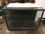 Lg. vintage lighted display case w/ 4 glass shelves, tested / needs maintenance, Sold as is.