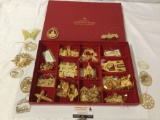 Large collection of gold tone metal Christmas tree ornaments, w/ Franklin Mint box.
