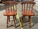 Pair of vintage wood swivel bar stools, approx 16 x 17 x 35 in.