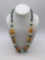 Nice large turquoise , bone , and yellow stone necklace w/ sterling silver clasp