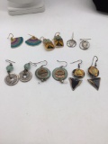 Nice selection of mid century earrings including laurel burch , and a pair of silver Mercury dimes