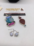 2 larger pendants marked .925 on body or clasp and a pair of .925 earrings various stones / glass