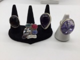 4 large heavy marked .925 silver rings with various stones