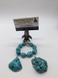 2 large turquoise ? nugget pendants and a turquoise bracelet