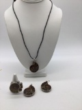 Unique matching set of fossilized snail earrings necklace and ring