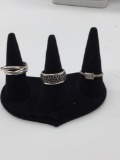 Selection of 3 sterling Silver marked .925 women?s rings sizes 5, 6, and 7 / right to left