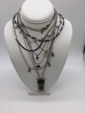 Larger selection of 8 silver toned fashion necklaces see pics