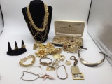 Large selection of mostly vintage gold toned jewelry see pics