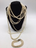 Large selection of faux Pearl necklaces And a bracelet