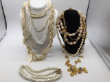 Selection off vintage fashion necklaces one with a matching pair of earrings