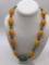 Large necklace with pressed Amber , turquoise nuggets and a hand carved scarab