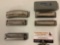 5 pc. lot of vintage harmonicas: Hohner, Lee Oskar. 1 with case.