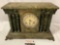 Antique New Haven Clock Co. wood case mantle clock w/ metal clawfoot design, sold as is.