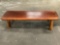 Vintage natural wood bench seat, approximately 51 x 15 x 12 in.