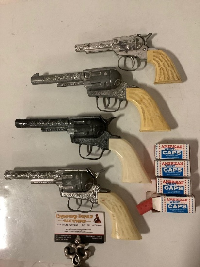 4 pc. lot of vintage metal toy cap guns / pistols w/ 4 boxes of American West caps. 3x Pony Boy,