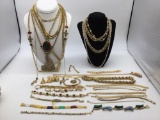 Amazing collection of gold toned estate jewelry , necklaces, bracelets, 2 sets of earrings