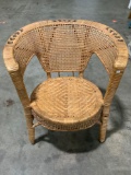 Vintage woven wicker chair w/ nice design, approx 24 x 22 x 27 in.