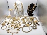 Huge selection of gold toned jewelry, some signed , Monet, Trifari, mamselle, see pics