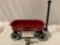 Mini Radio Flyer metal / plastic toy wagon, approx 25 x 6 x 8 in.