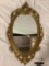 Vintage goldtone frame mirror in nice condition, approx 16 x 30 in.