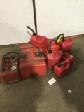 Large selection of gas cans , 2 boat motor gas cans and 7 other gas cans