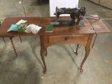 Antique electric singer sewing machine made in Canada model number 15 Dash 91
