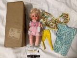 Vintage EEGEE Co. vinyl / plastic baby doll w/ outfits, bottle and mailer box, approx 11 x 4 in.