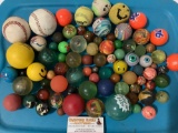 Large collection of vintage balls; super balls, baseballs, hackey sacks and more.
