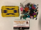 Bead lot: small collection of various beads, plus beaded belt buckle, approx 3.5 x 2 in.