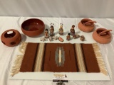Nice lot of woven mat, clay bowls, nativity scene figures made in Mexico.