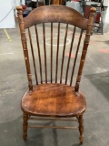 Vintage wood carved chair with high back and wide seat, approximately 23 x 19 x 44 in.