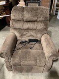 Electronic lift chair upholstered recliner, tested/working, shows wear, approx 33 x 34 x 47 in.