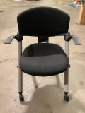 Rolling office chair, seat shows wear, approx 24 x 19 x 32 in.