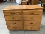 Vintage wood 8-drawer lowboy dresser, shows wear, approx 50 x 25 x 35 in.