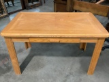 Pine wood desk table with one drawer, shows finish wear, approx 50 x 29 x 30 in.