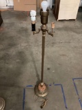 Antique standing metal parlor lamp w/ intricate design, no shade, tested/working, approx 13 x 56 in.